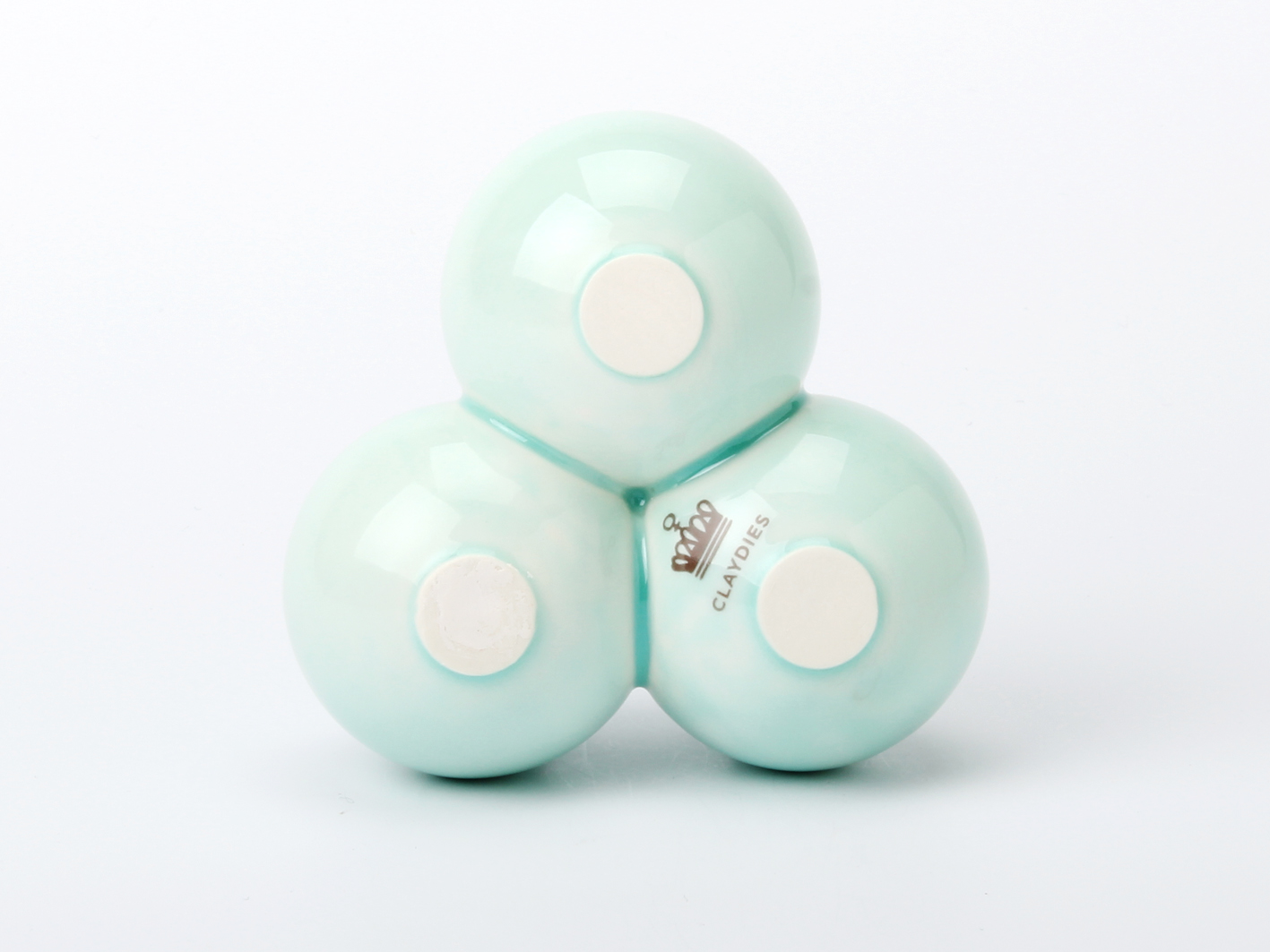 Claydies: Balls. Candle-holder with a turquoise glaze