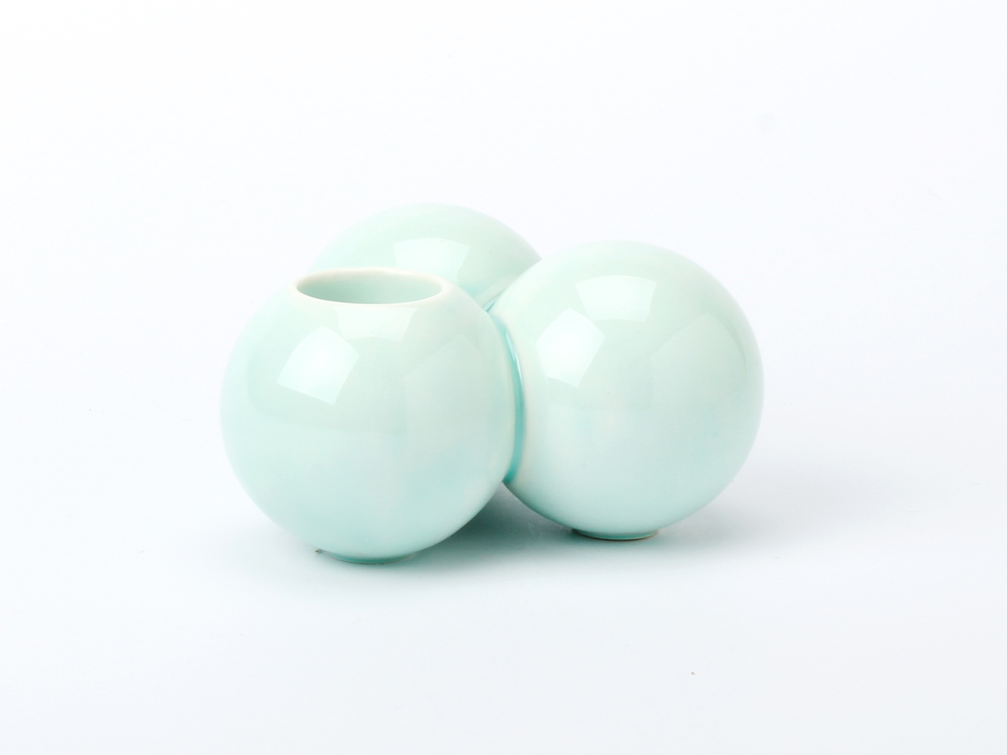 Claydies: Balls. Candle-holder with a turquoise glaze