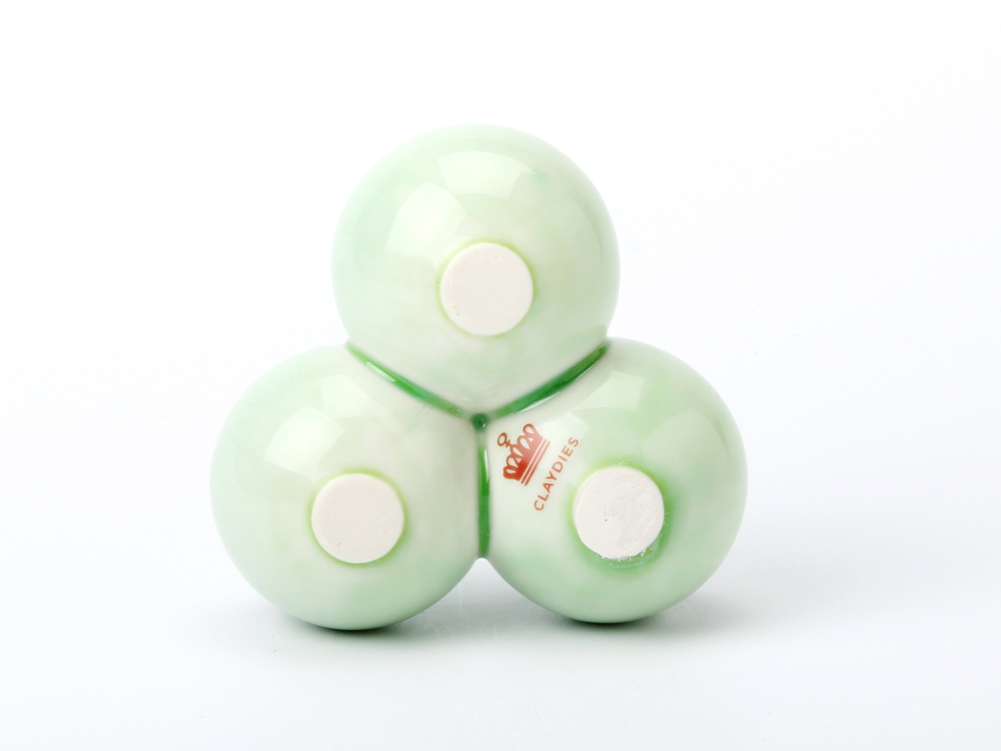 Claydies: Balls. Candle-holder with a green glaze