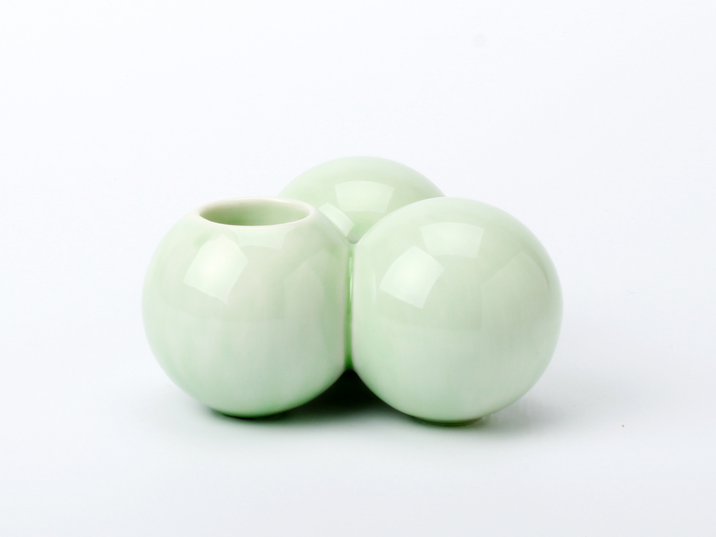 Claydies: Balls. Candle-holder with a green glaze